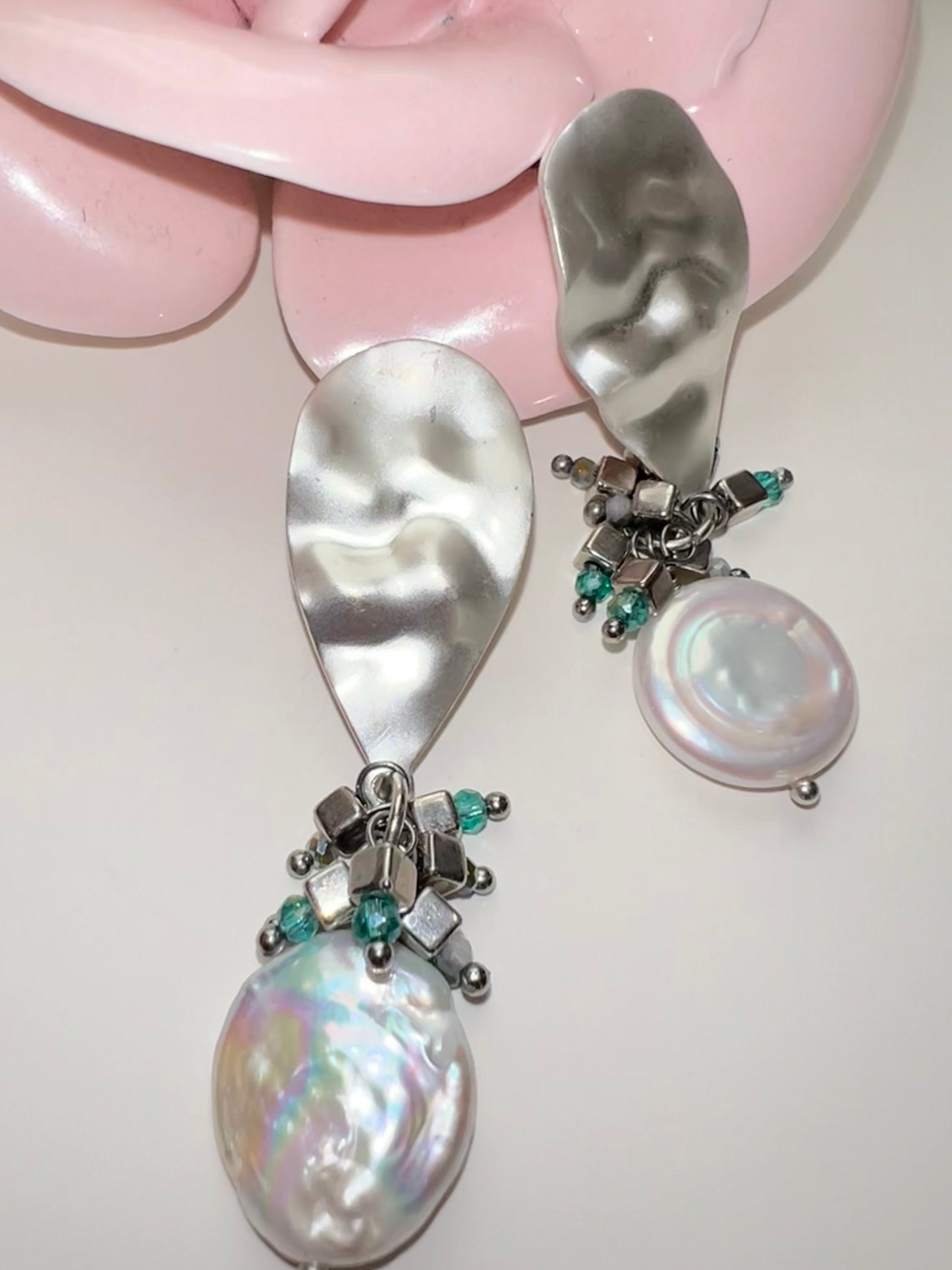 Pearl dangle earrings.